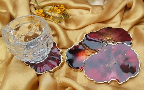 Set of 4 Deep Red Resin Coasters with gold edges 
