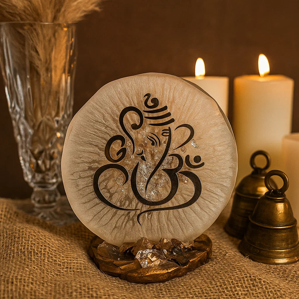 Ganesha home decor piece in a sacred space with bells and candles