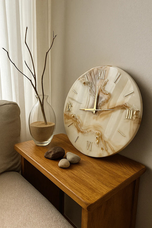 Marble-patterned clock on a wooden side table with decorative items.