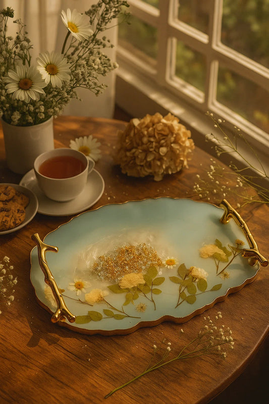 a floral resin tray at evening tea time with dried flowers tea and cookies 