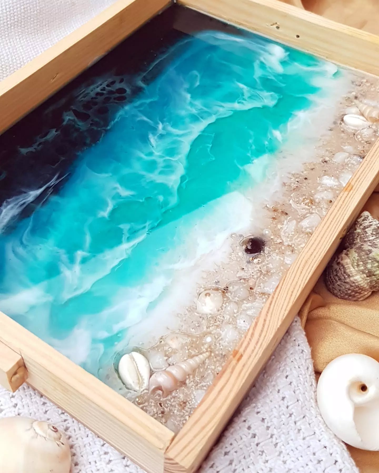 a beach inspired resin art serving tray